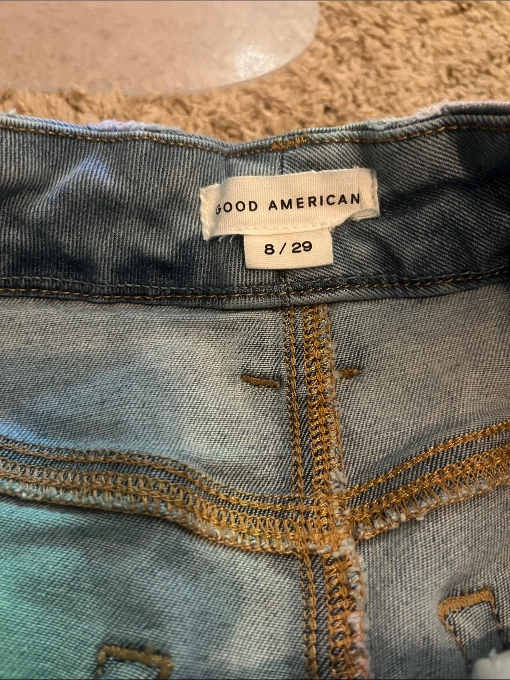 Good American Light Blue Flare Jeans raw hem crop 29” size 8